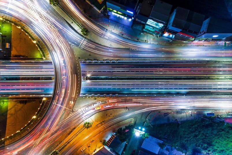 Aerial shot top view circle road at night..